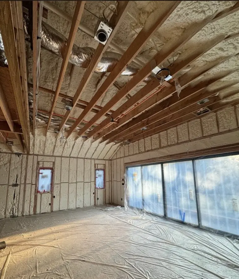 Interior walls and ceiling insulated with spray foam during new construction in Venus