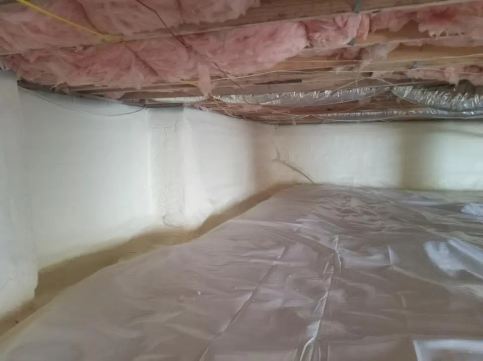 Crawl space encapsulation with closed-cell spray foam for Commercial Roof Restoration in Venus
